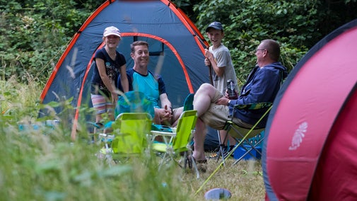 Families enjoying a camping event